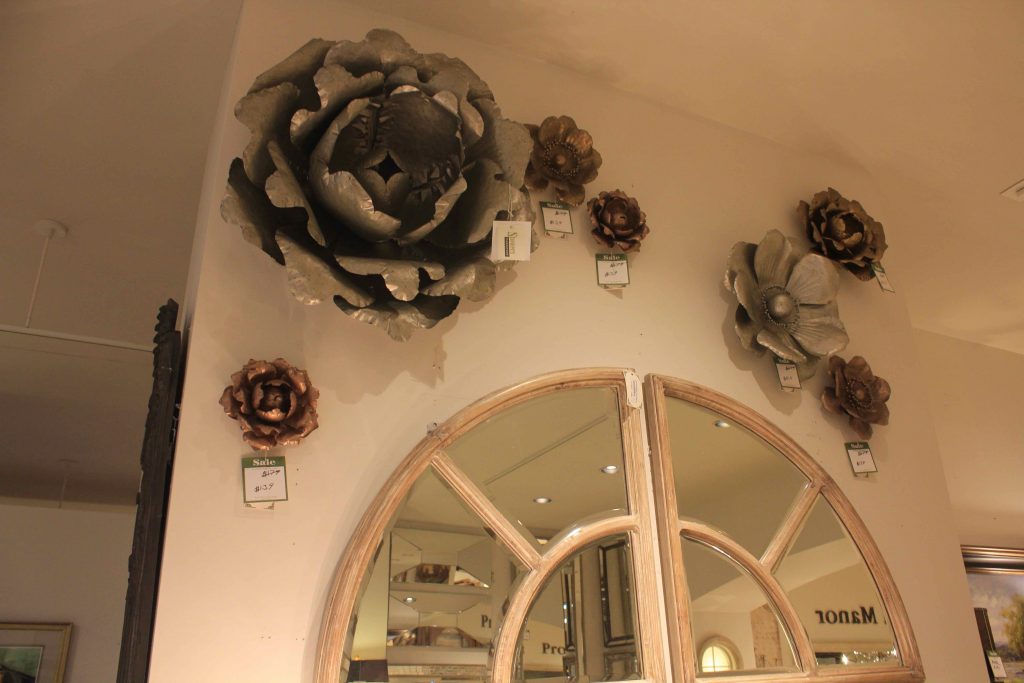 large and small metal flower wall decor