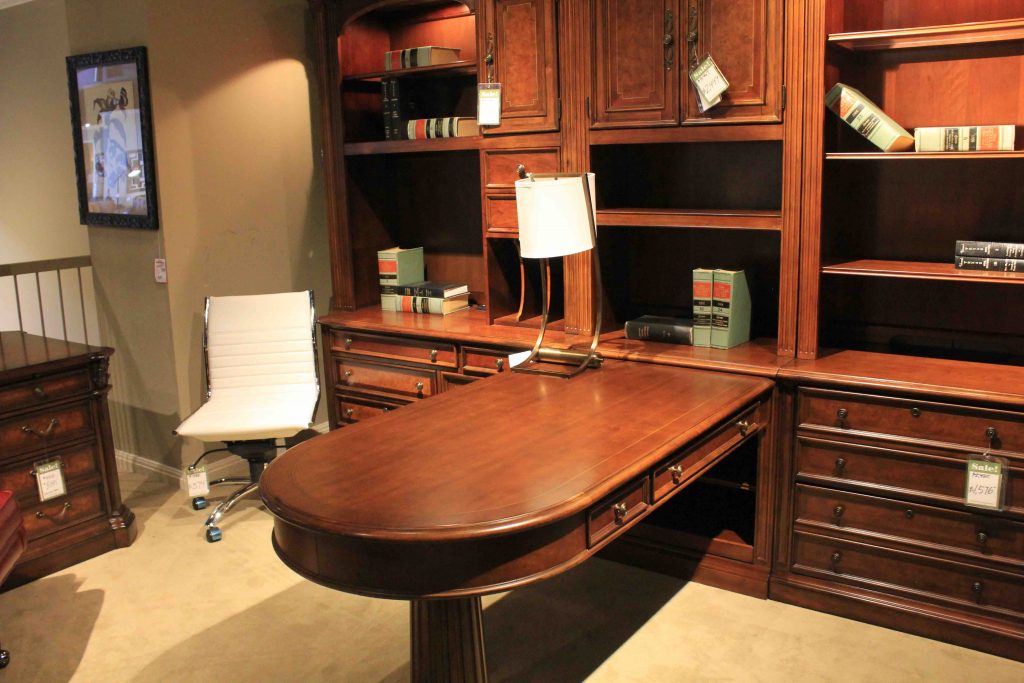 wooden desk and cabinets