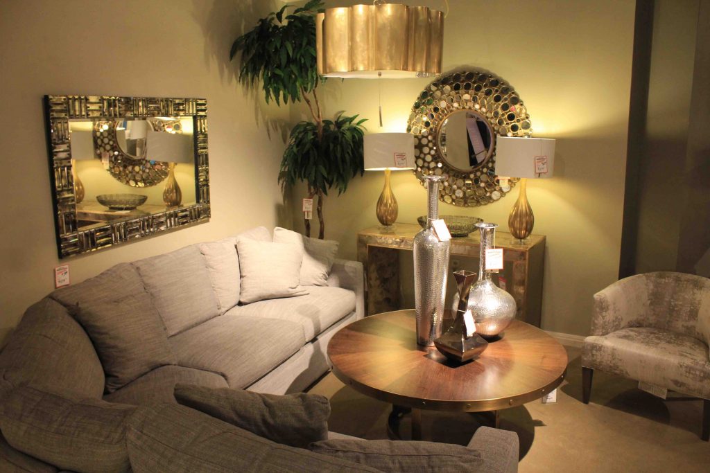 living room with multiple mirrors