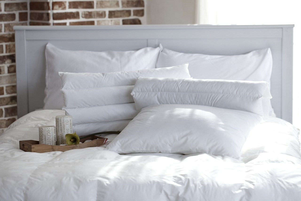 white fluffy bedding and pillows