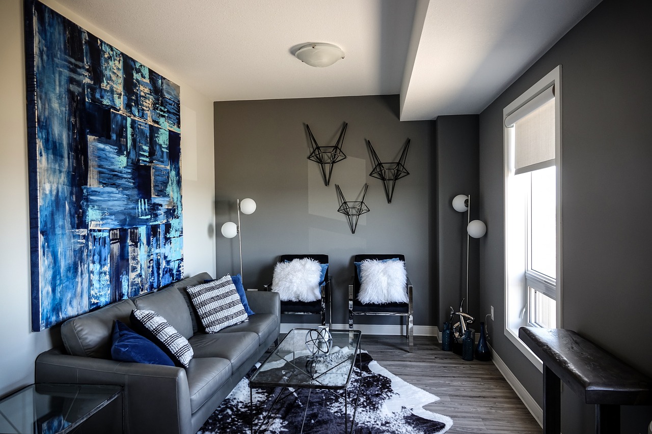 contemporary living room with hues of blue and black